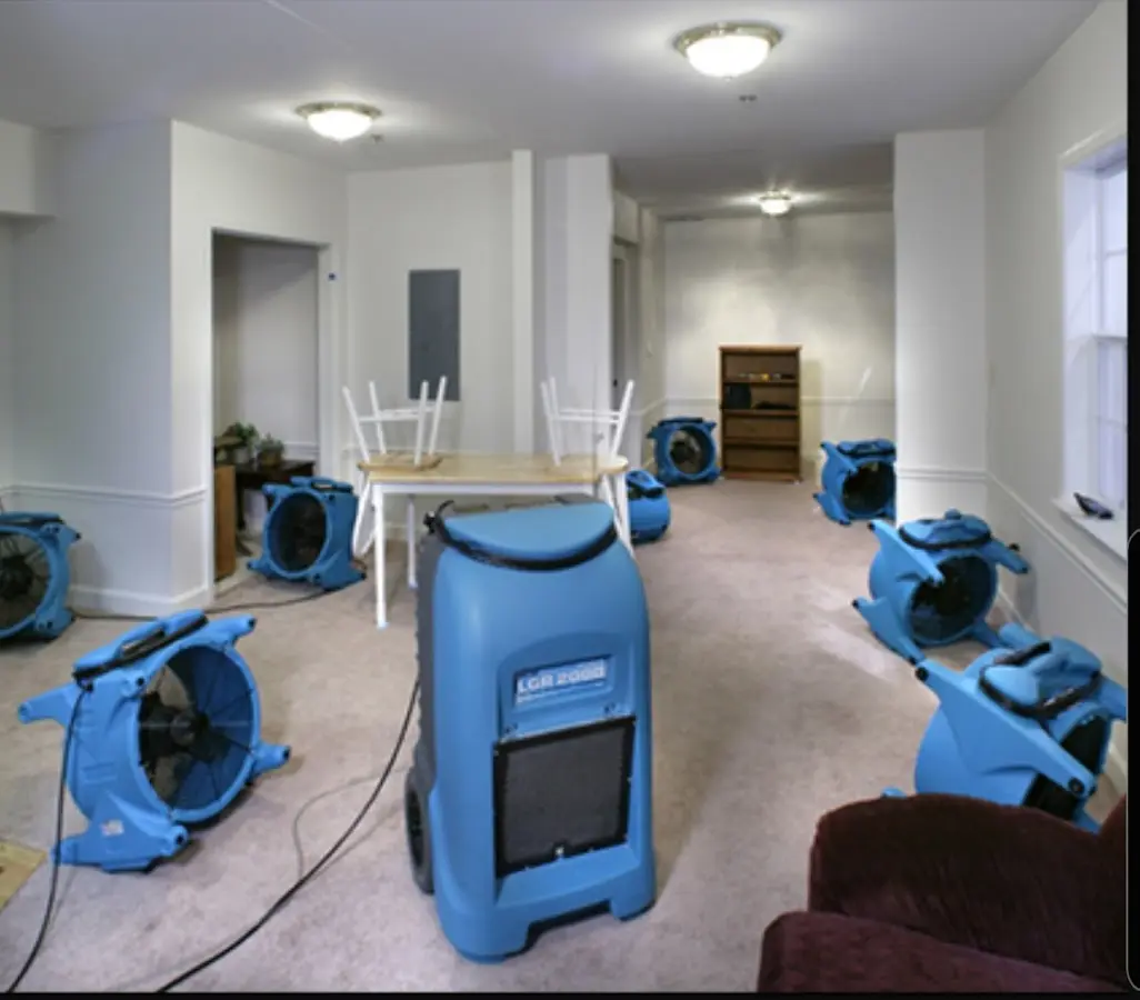 Air movers and dehumidifier setup for Water Damage Restoration in Louisville